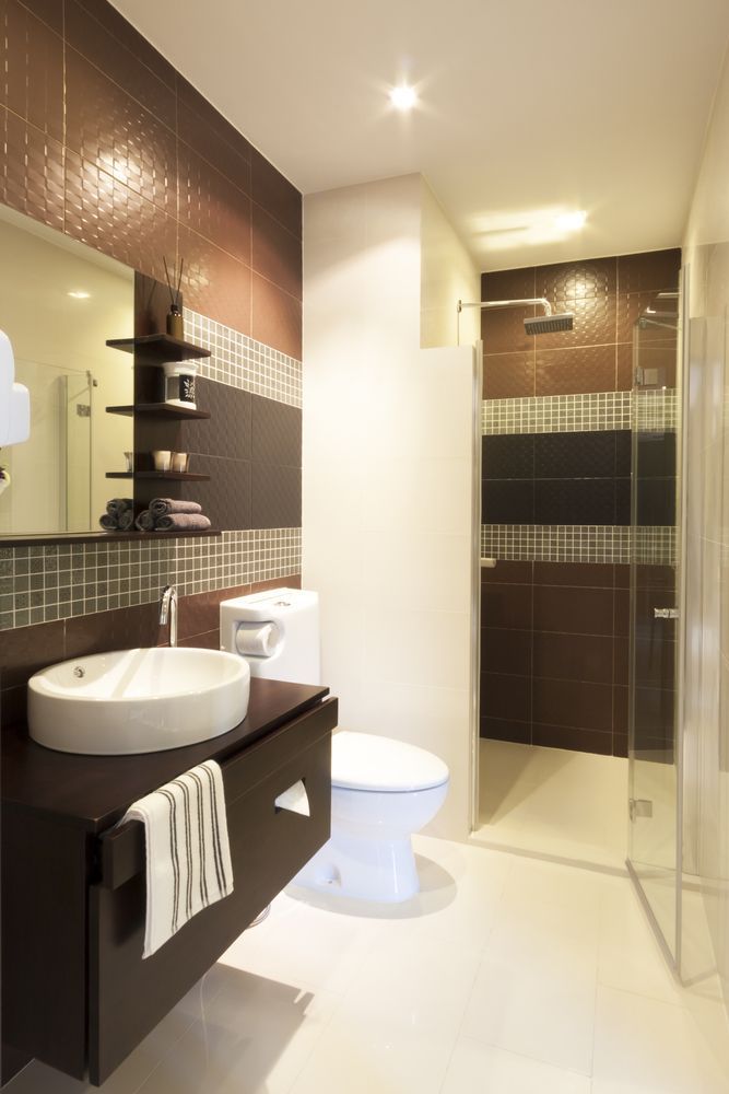 A Bathroom with A Toilet, Sink, Mirror and Walk in Shower — Colour Splash in Cessnock, NSW