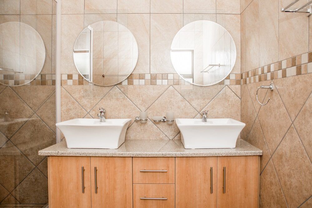 A Bathroom with Two Sinks and Three Mirrors — Colour Splash in Nelson Bay, NSW