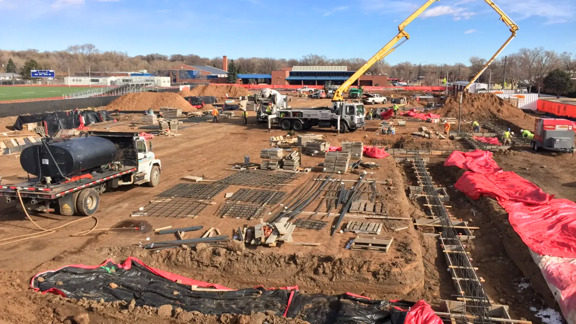 Contractor reviewing a detailed commercial concrete bid with
line items for formwork, reinforcement, and finishing.