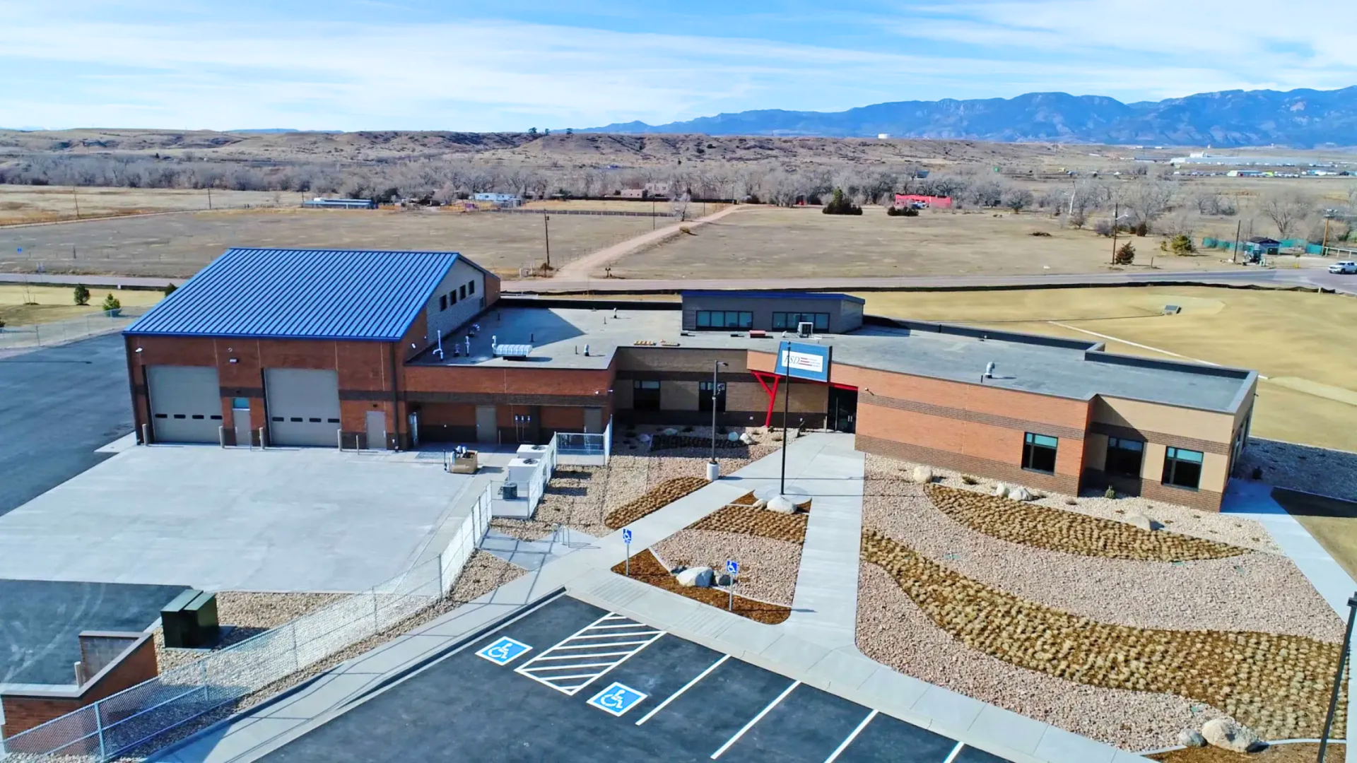 Commercial concrete parking lot and access area installed at a business property in Colorado Springs