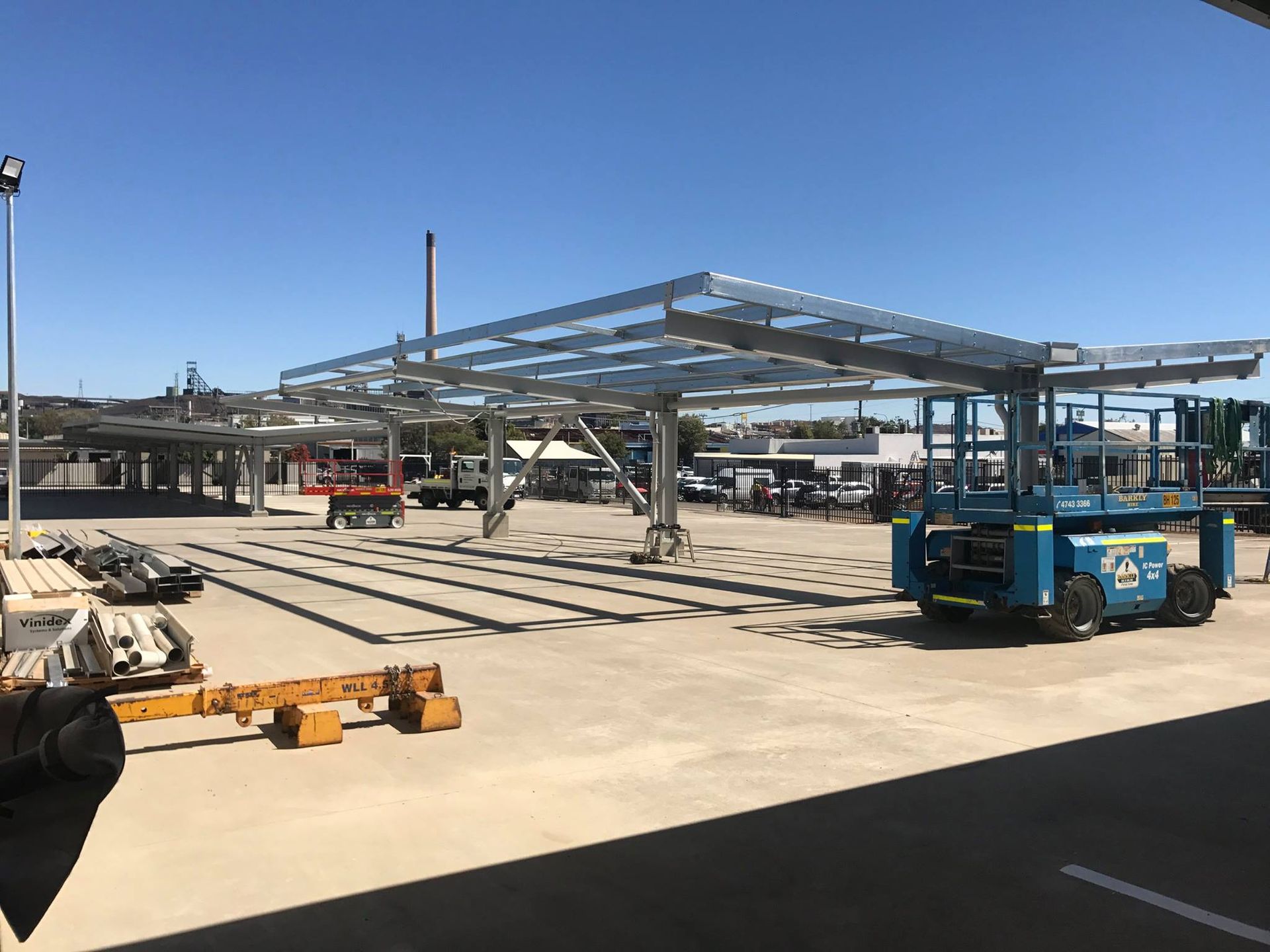 Construction Site With Steel Frame Structure, Equipment — Custom Steel Fab in Bohle, QLD