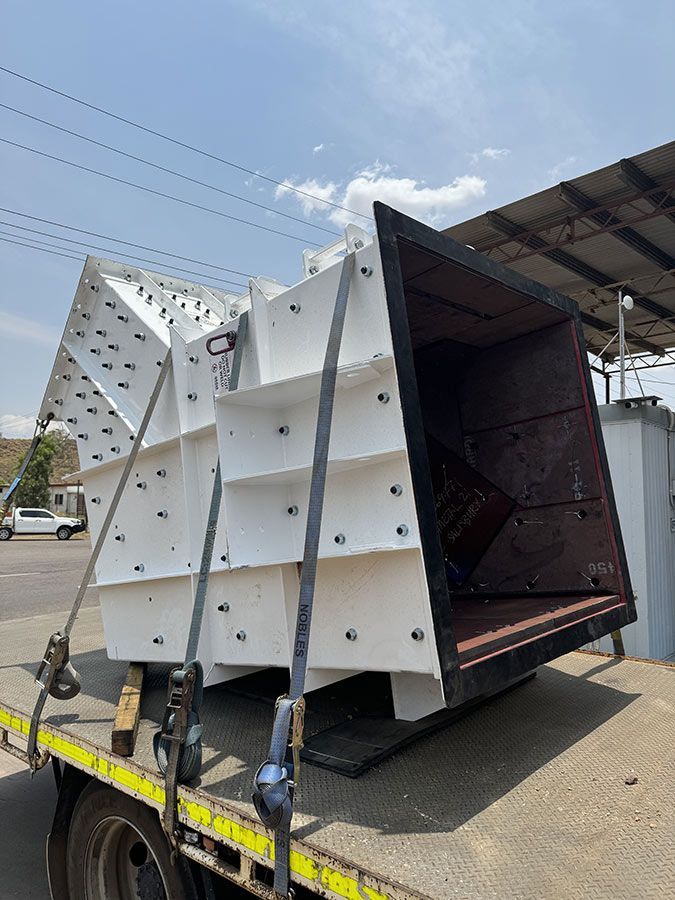 Large White Industrial Hopper Trailer on a Road — Custom Steel Fab in Bohle, QLD