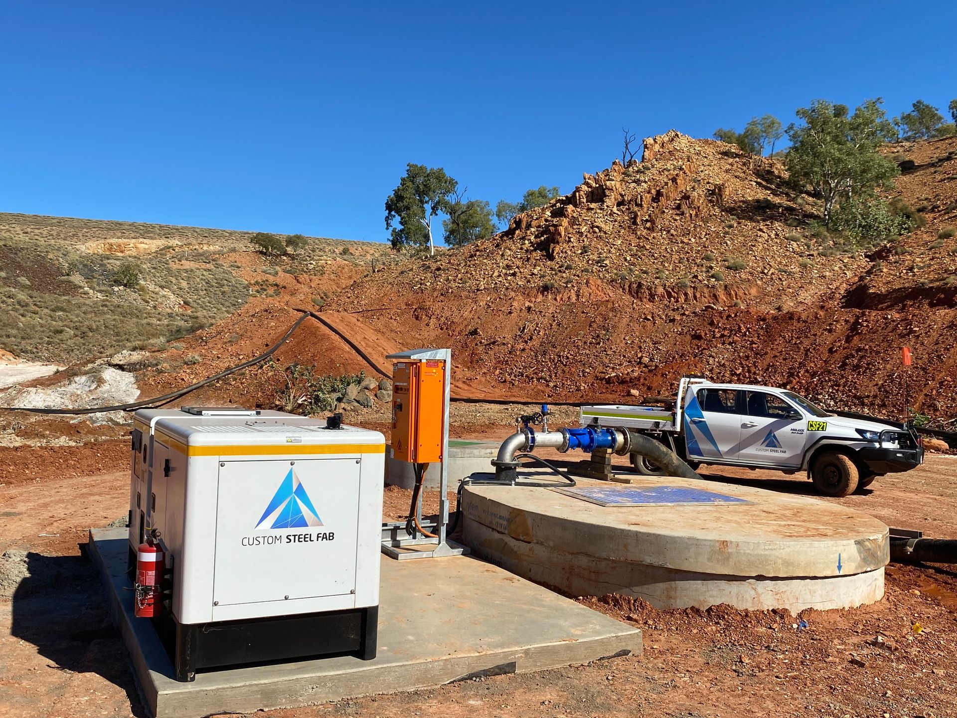 Construction Site With a White Utility Truck, Equipment Trailer — Custom Steel Fab in Bohle, QLD