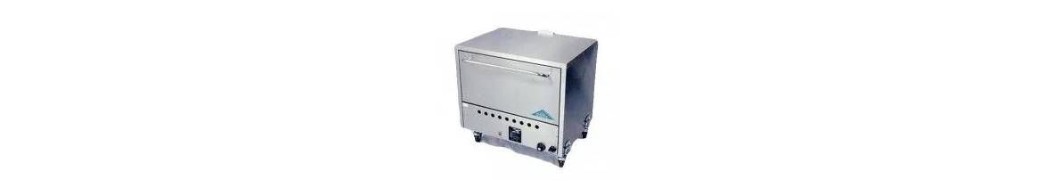 A silver, box-shaped industrial device with multiple circular knobs and ports on its front panel.