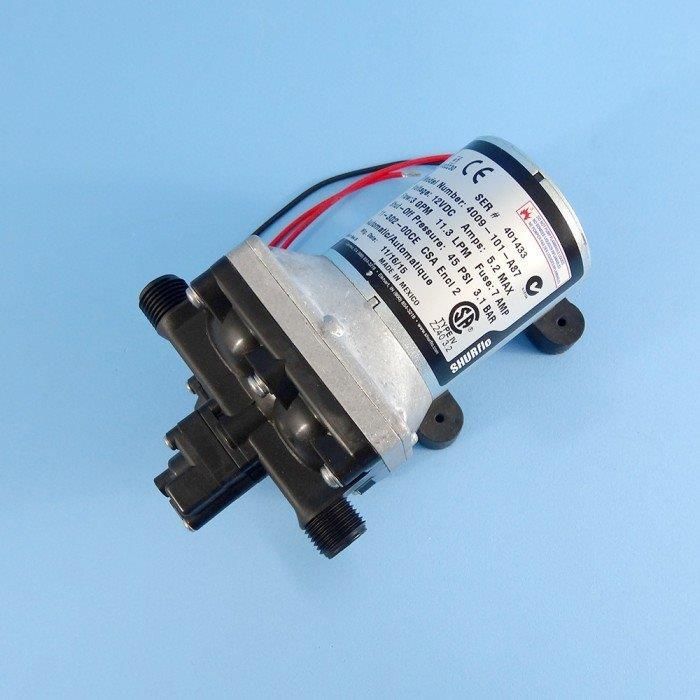 Water Pump With Black Fittings And Red/Black Wires — Caravan Experts In The Charters Towers Region, QLD