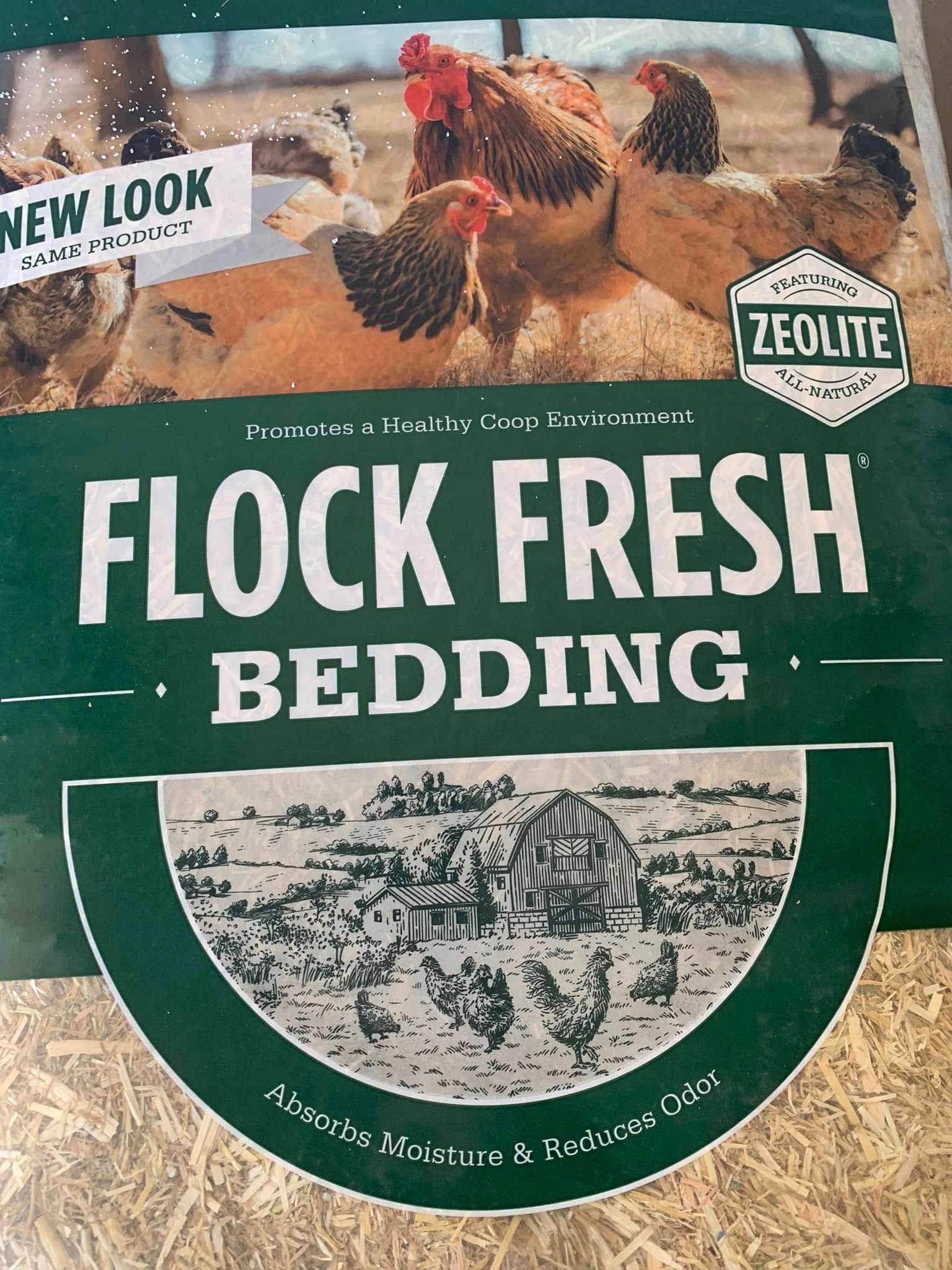 Green bag of Zeolite Flock Fresh Bedding with chicken coop photo and “New Look” label