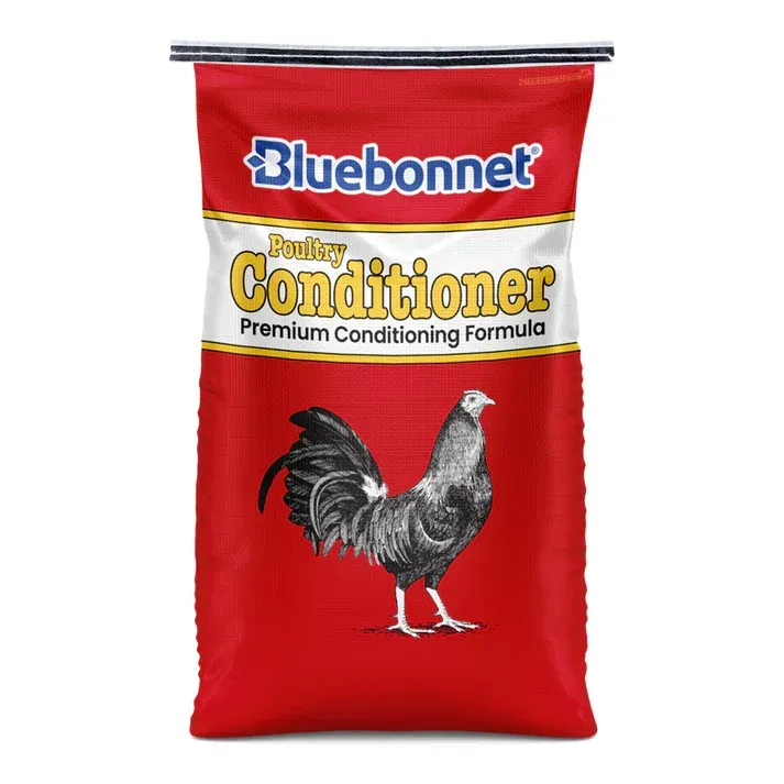 Bluebonnet poultry conditioner feed bag in red with a rooster illustration