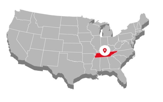 Gray U.S. map with a red location pin in the south-central region, over a highlighted white circle Gray U.S. map with a red location pin in the south-central region, over a highlighted white circle