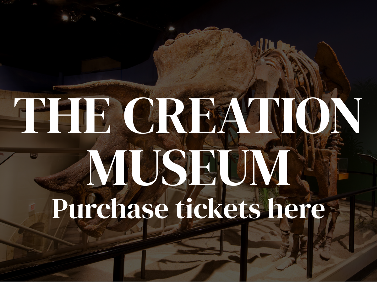 The Creation Museum sign with a dinosaur skeleton and “Purchase tickets here” text