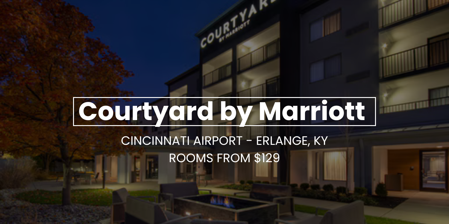 Courtyard by Marriott hotel exterior at night in Erlanger, KY, with room rates shown