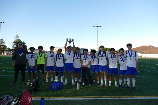 Boys Team Picture With Medals
