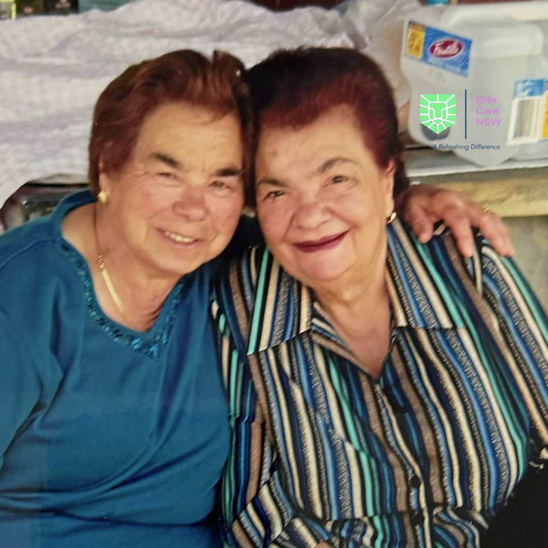 A support worker and participant talking together at home in Sydney