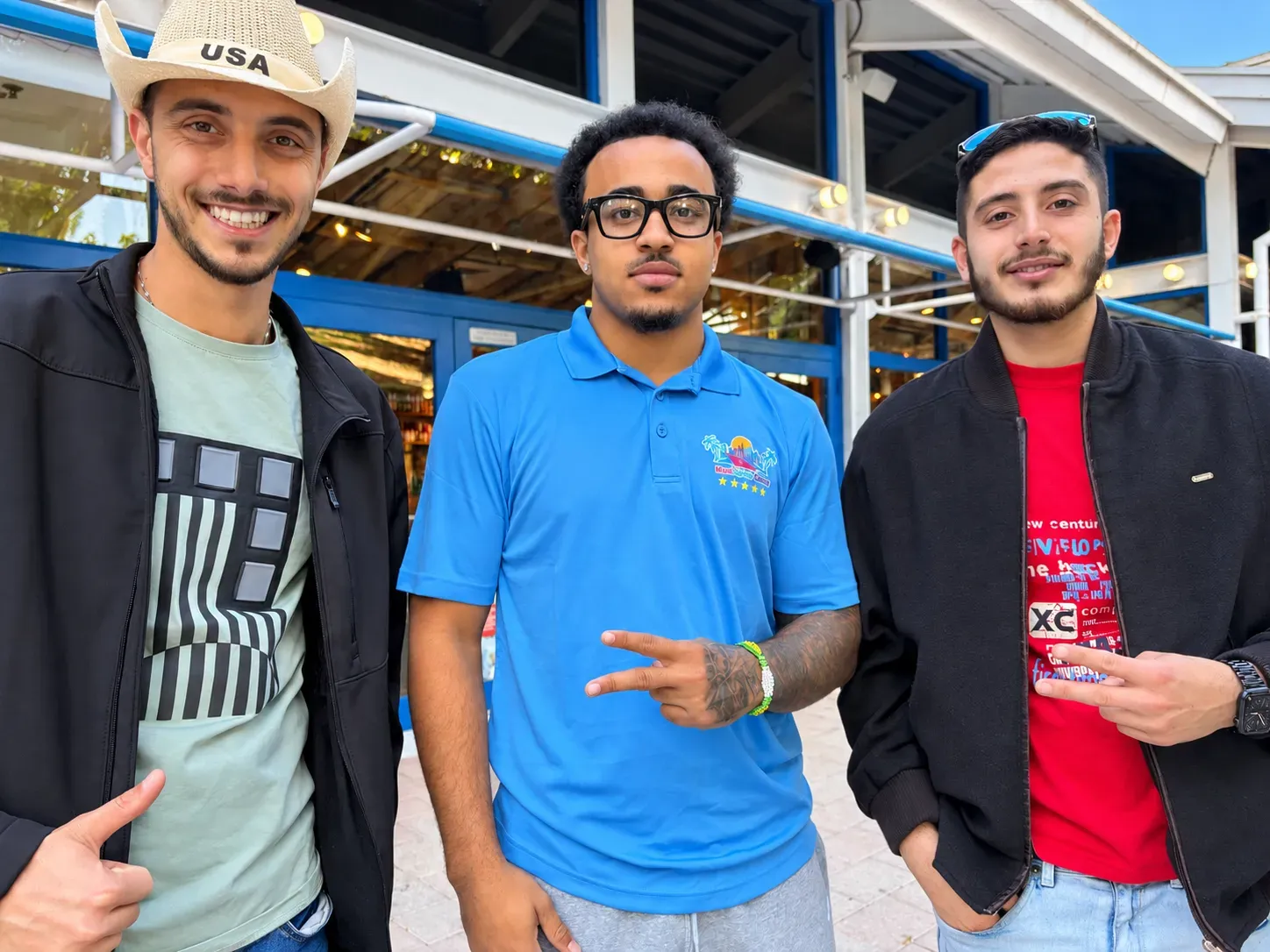 Skyline Cruises Miami team member taking a photo with riders before their jet ski rental at Bayside Marketplace