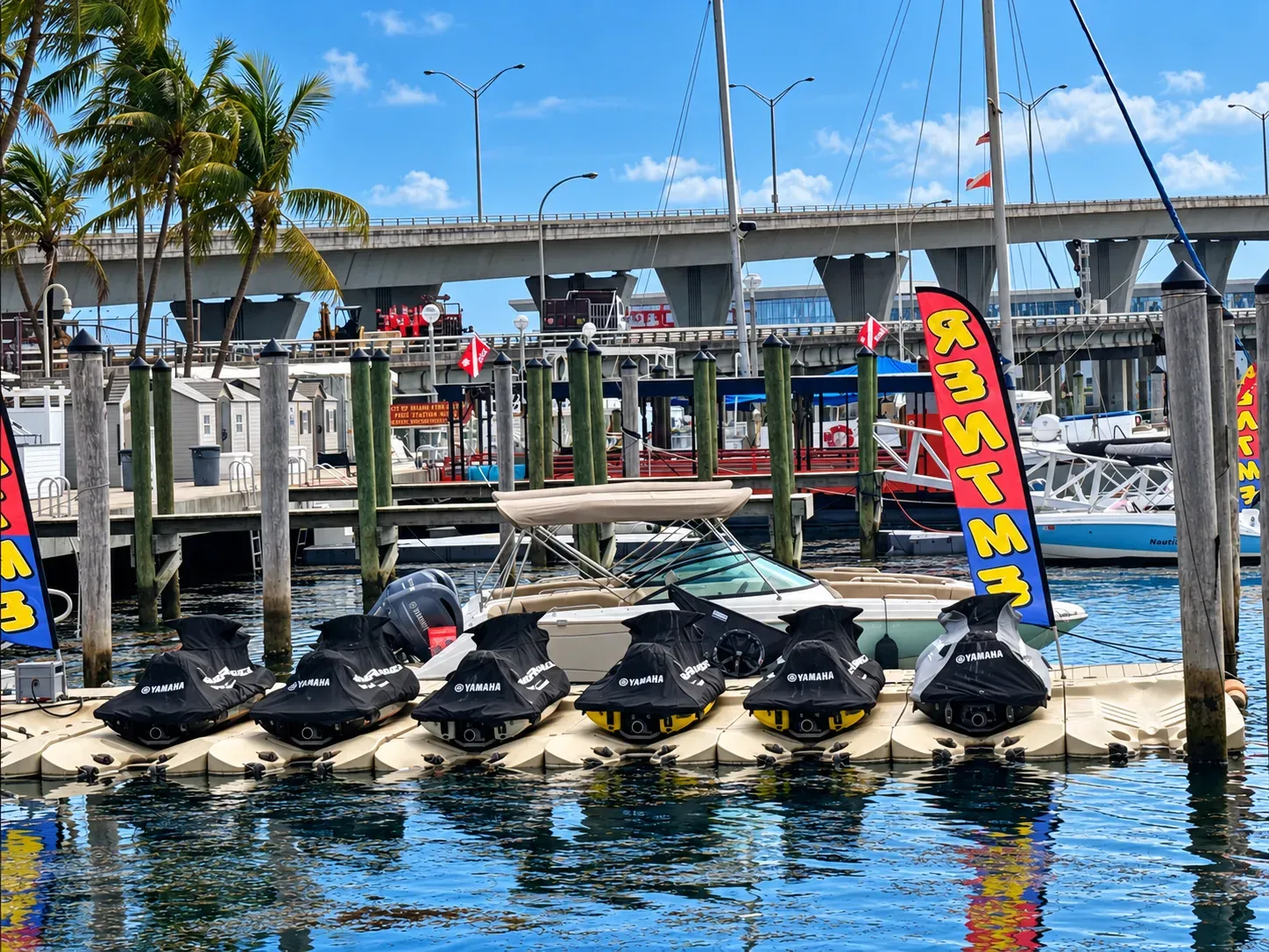 Jet ski rental dock at Bayside Marketplace in Miami with Yamaha WaveRunners ready for departure