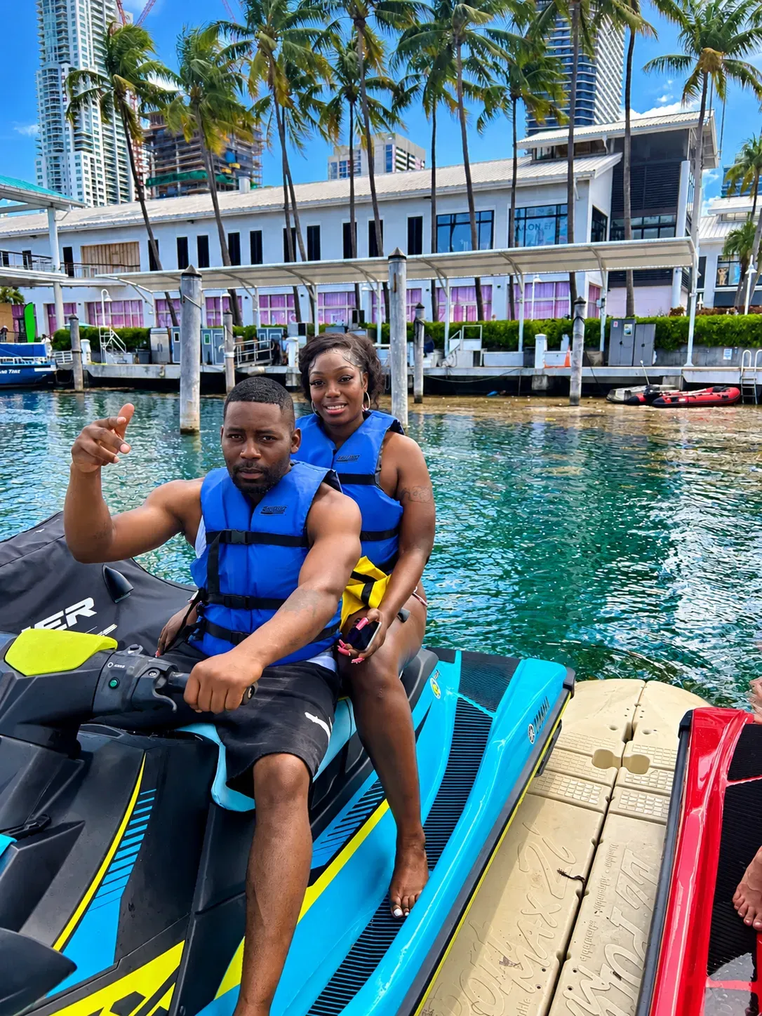 Couple starting a jet ski rental in Miami from Bayside Marketplace marina