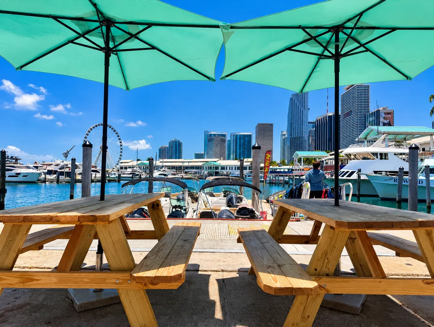 Waiting area for jet ski rentals in Miami from Bayside Marketplace overlooking the marina and Downtown Miami skyline