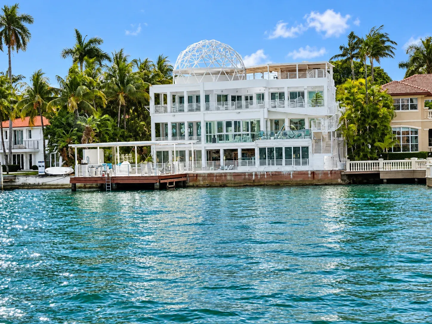 Mansions of Miami Beach waterfront home seen during a sightseeing boat tour in Miami