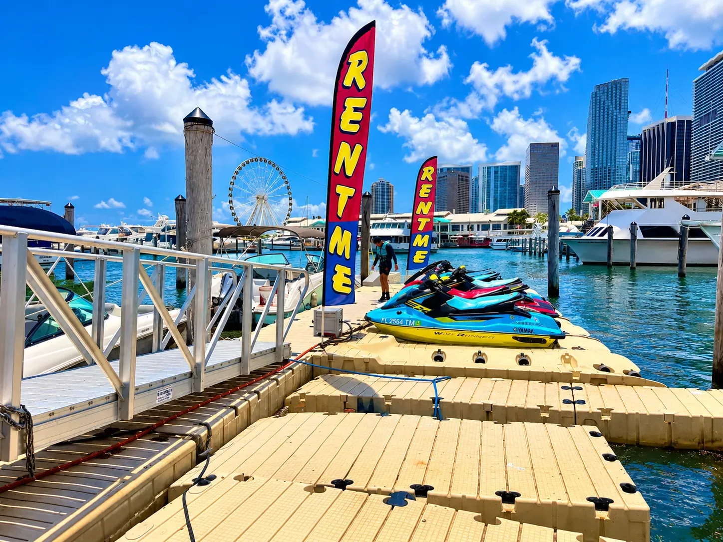 Miami Guided Jet Ski Tours fleet lined up at the Bayside Marketplace rental dock in Downtown Miami
