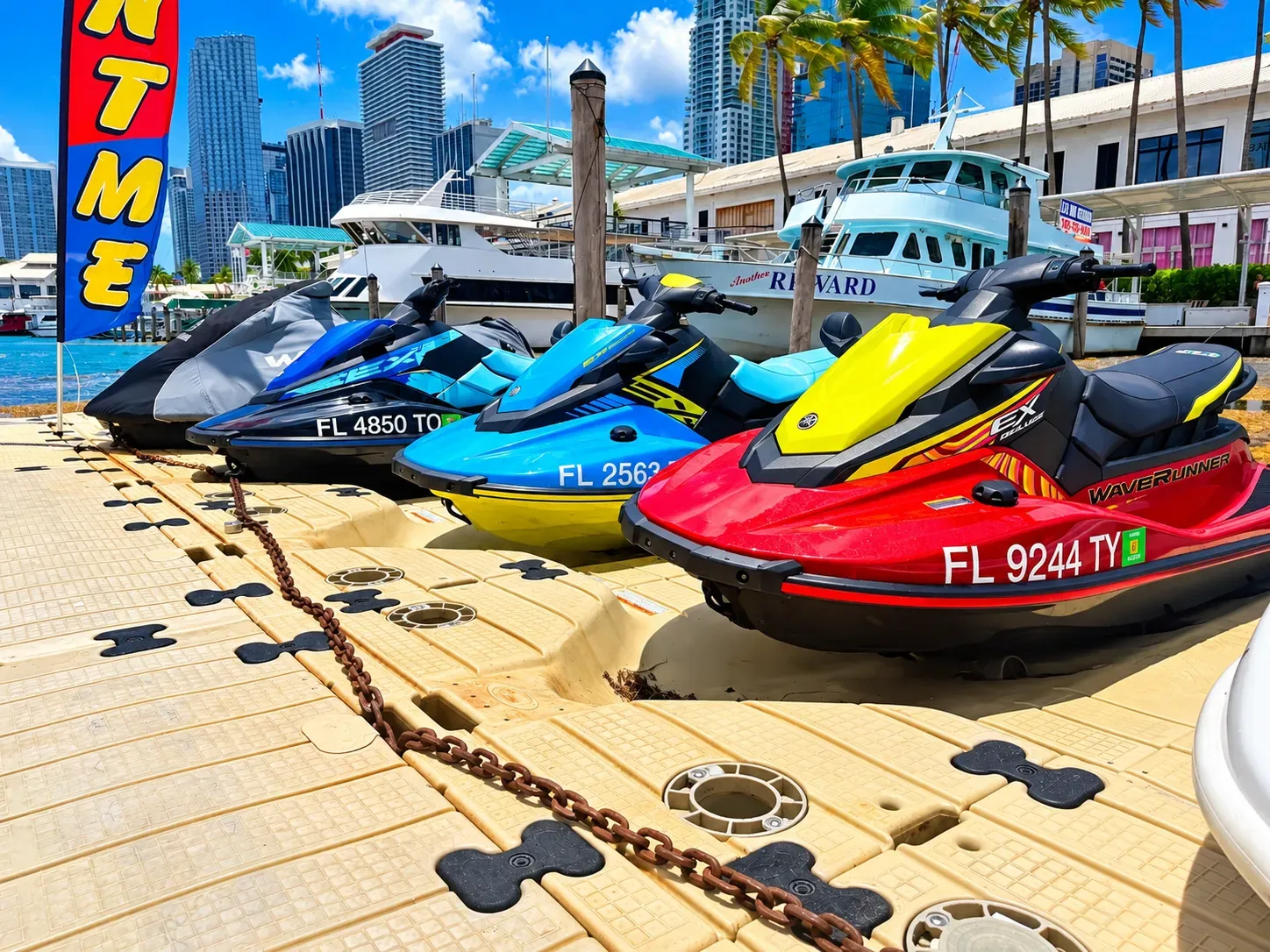 Miami jet ski rentals with Yamaha WaveRunners lined up at Bayside Marina in Downtown Miami