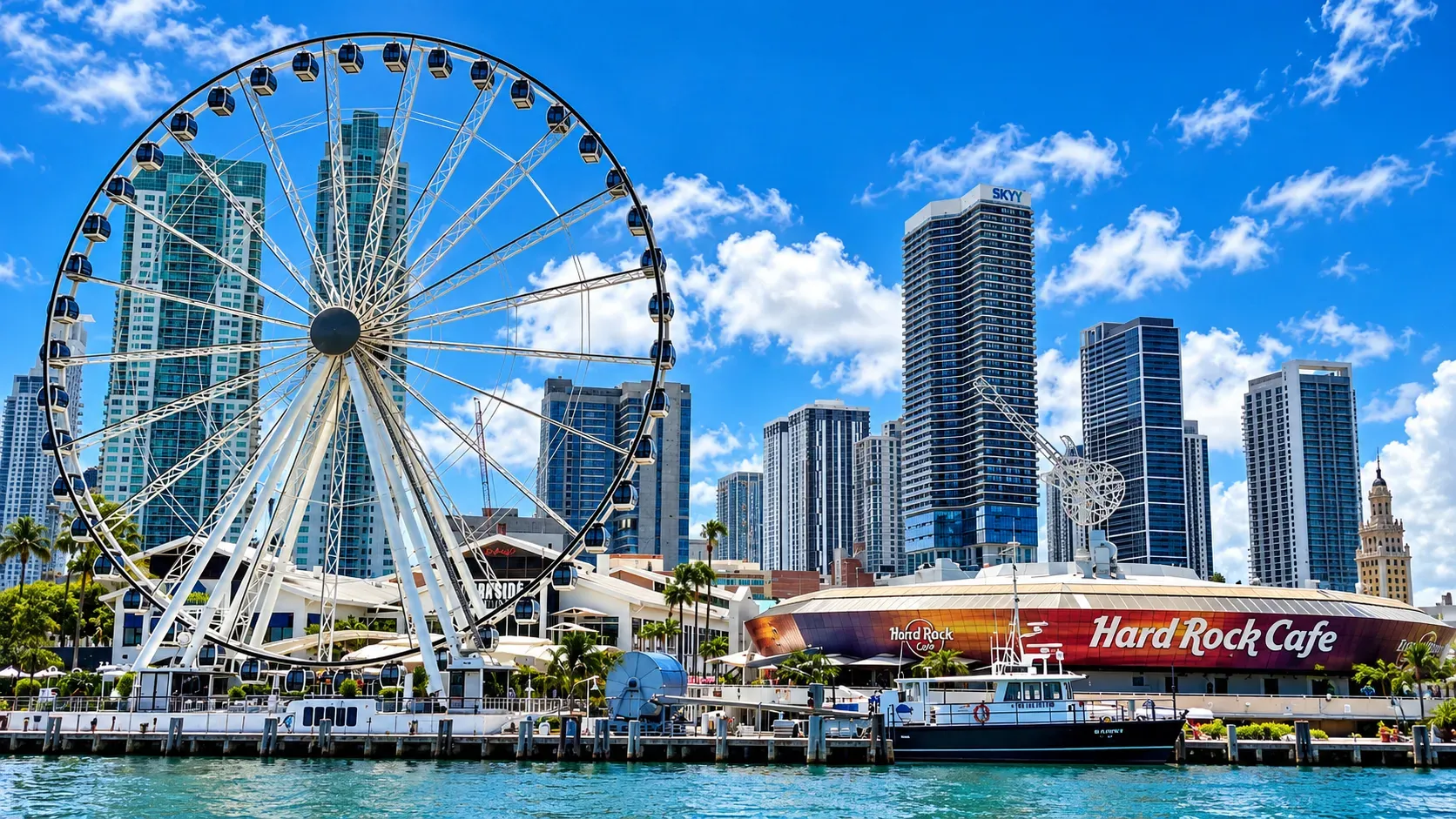 Views seen from our Miami sightseeing tours and rentals at Bayside Marketplace with Skyviews Miami and the Downtown skyline