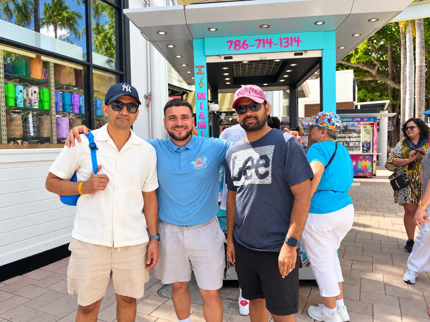Skyline Cruises Miami team in Bayside posing with riders before a jet ski tour