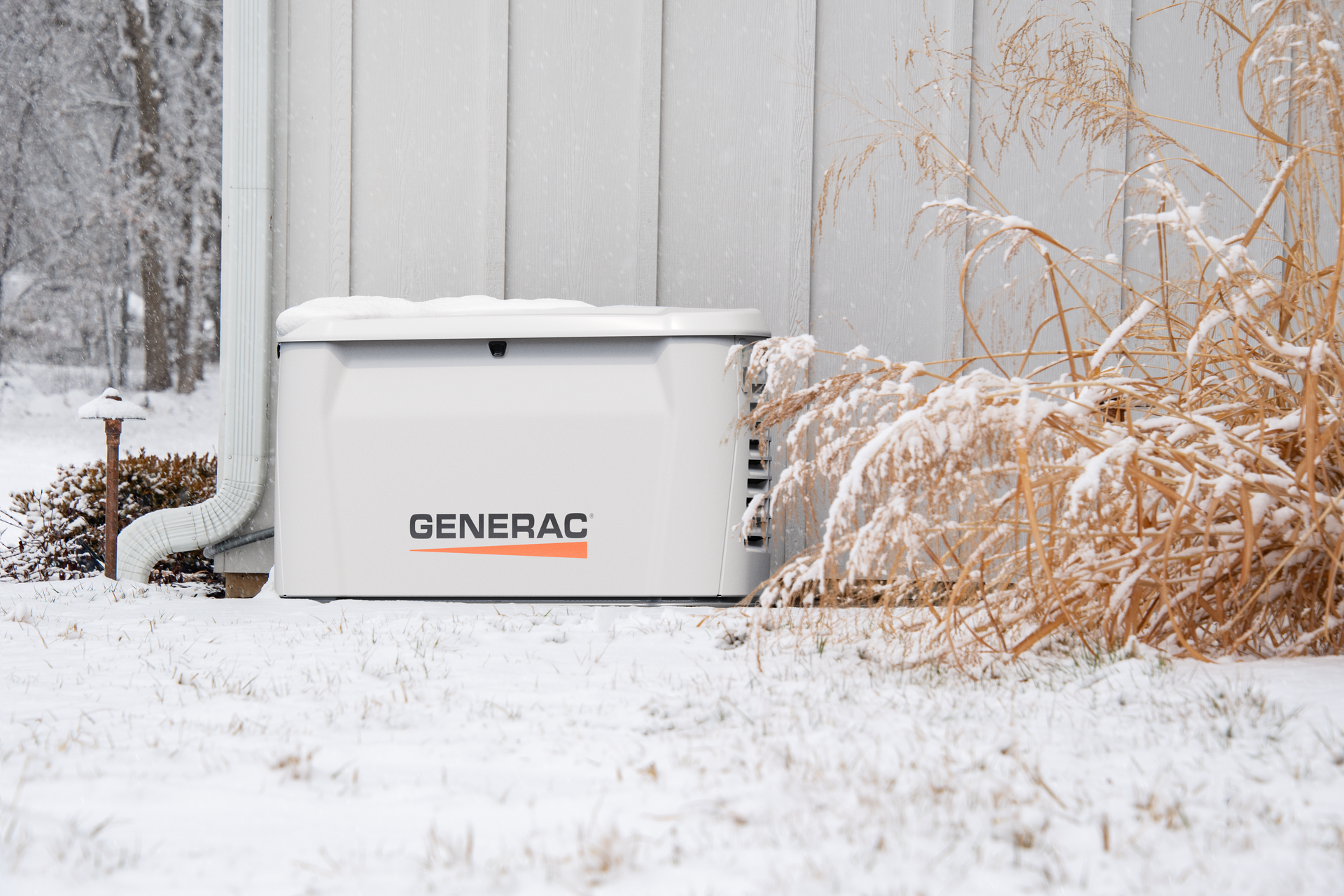 Generac generator in the snow.