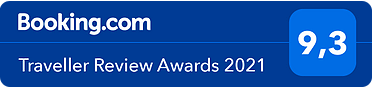 A blue sign that says booking.com traveller review awards 2021
