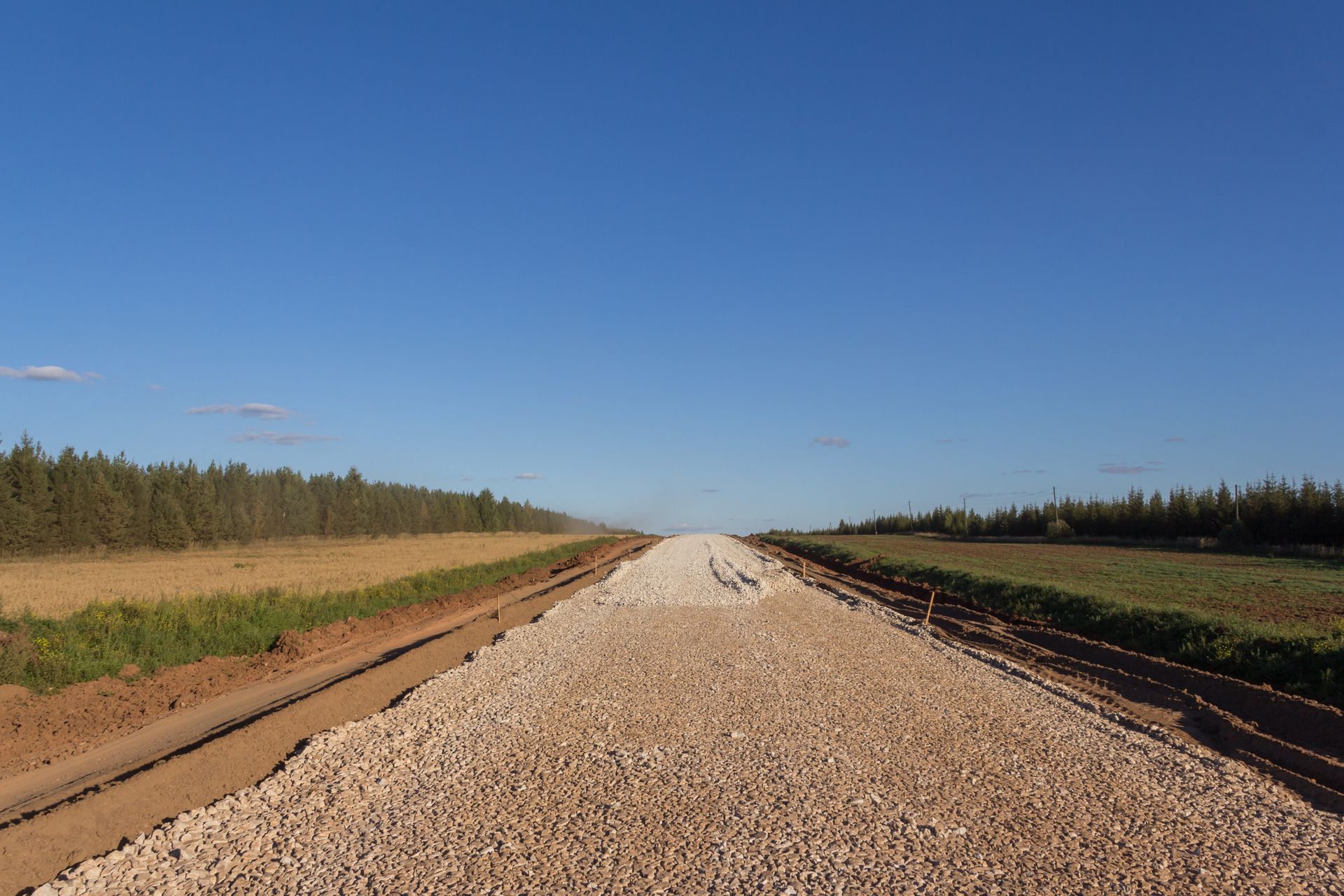 The gravel layer of a rural driveway being installed in Central Kentucky