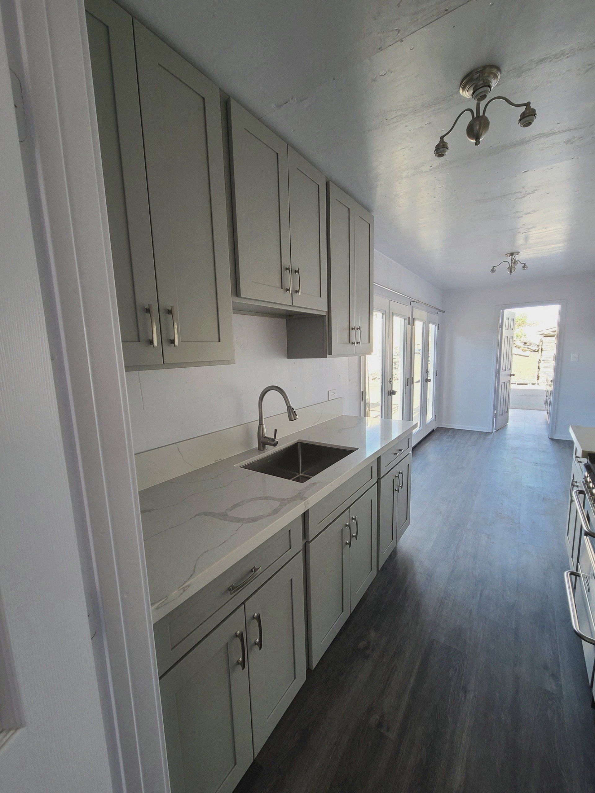 Custom space and Individualized Solution with cabinets and sink