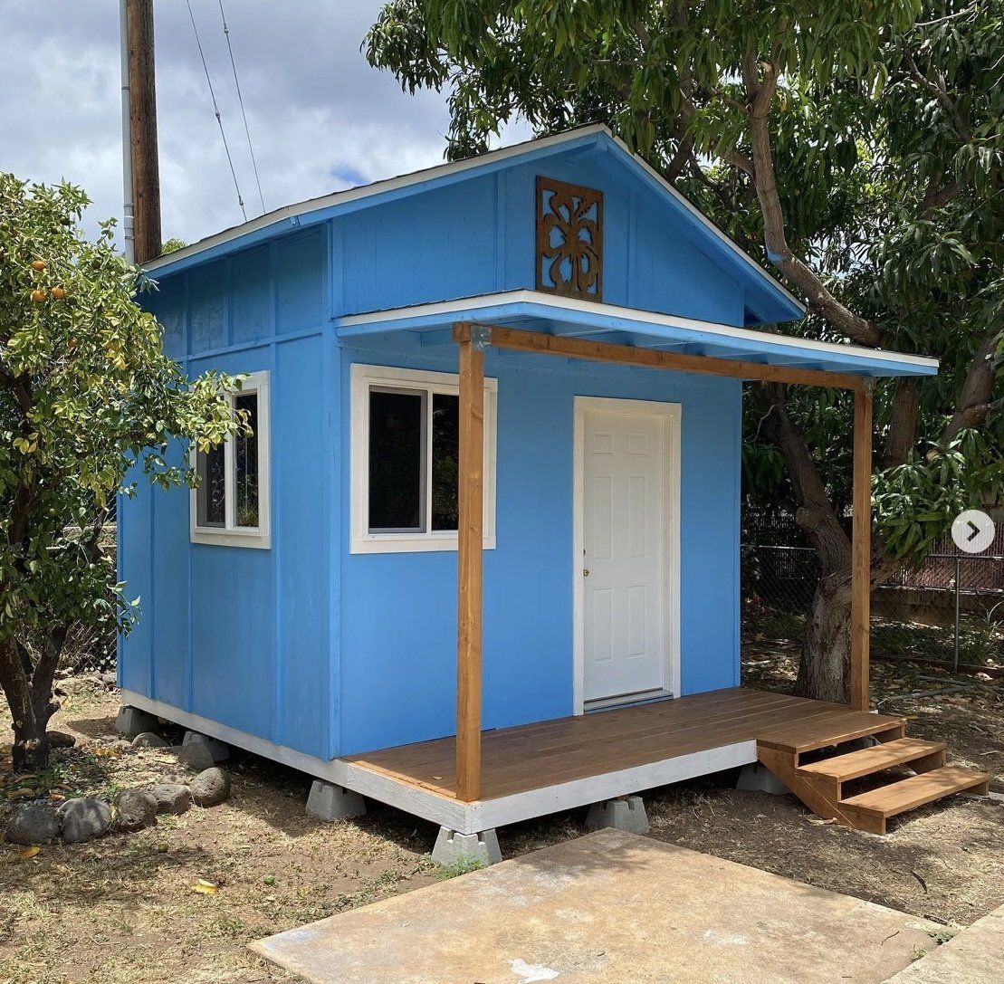 Studio Shed with windows and door and decking