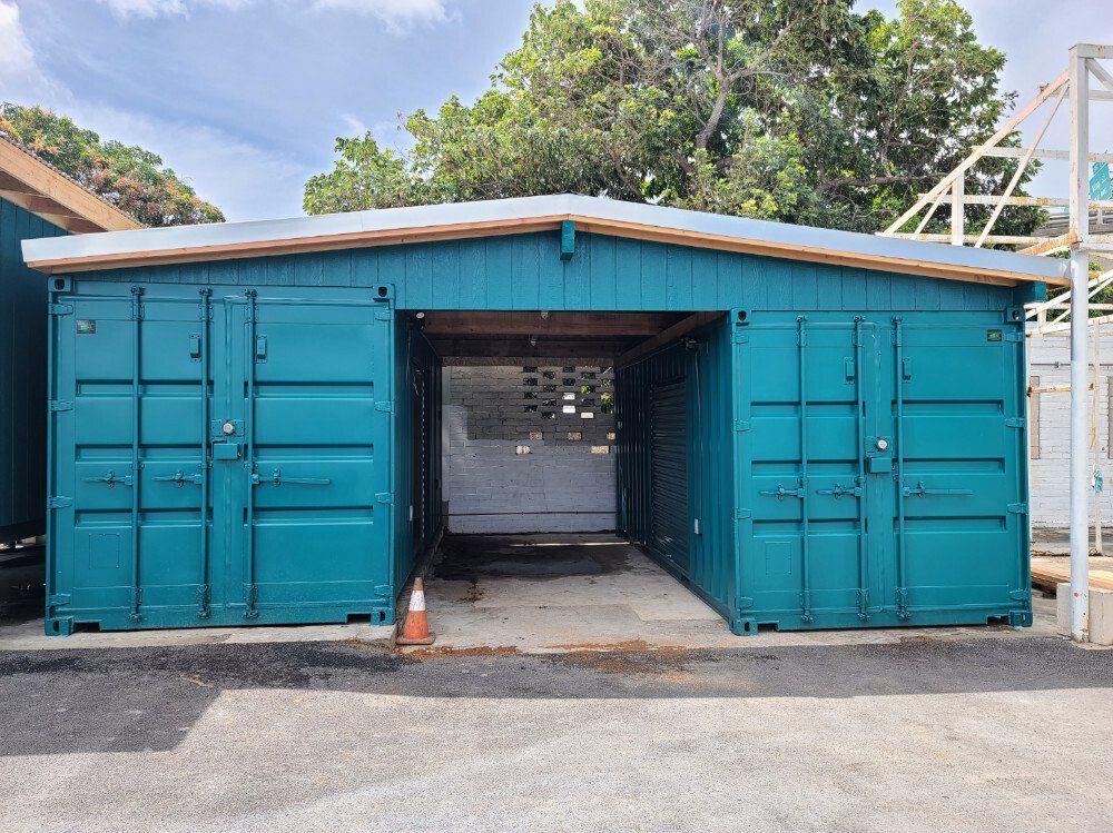 City and County of Honolulu Kapahulu Coning Yard showing front view of dual containers and custom roof