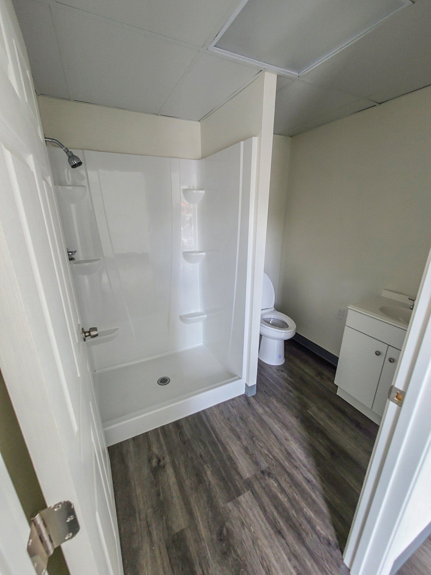 Custom Shipping Container Interior with custom shower and toilet