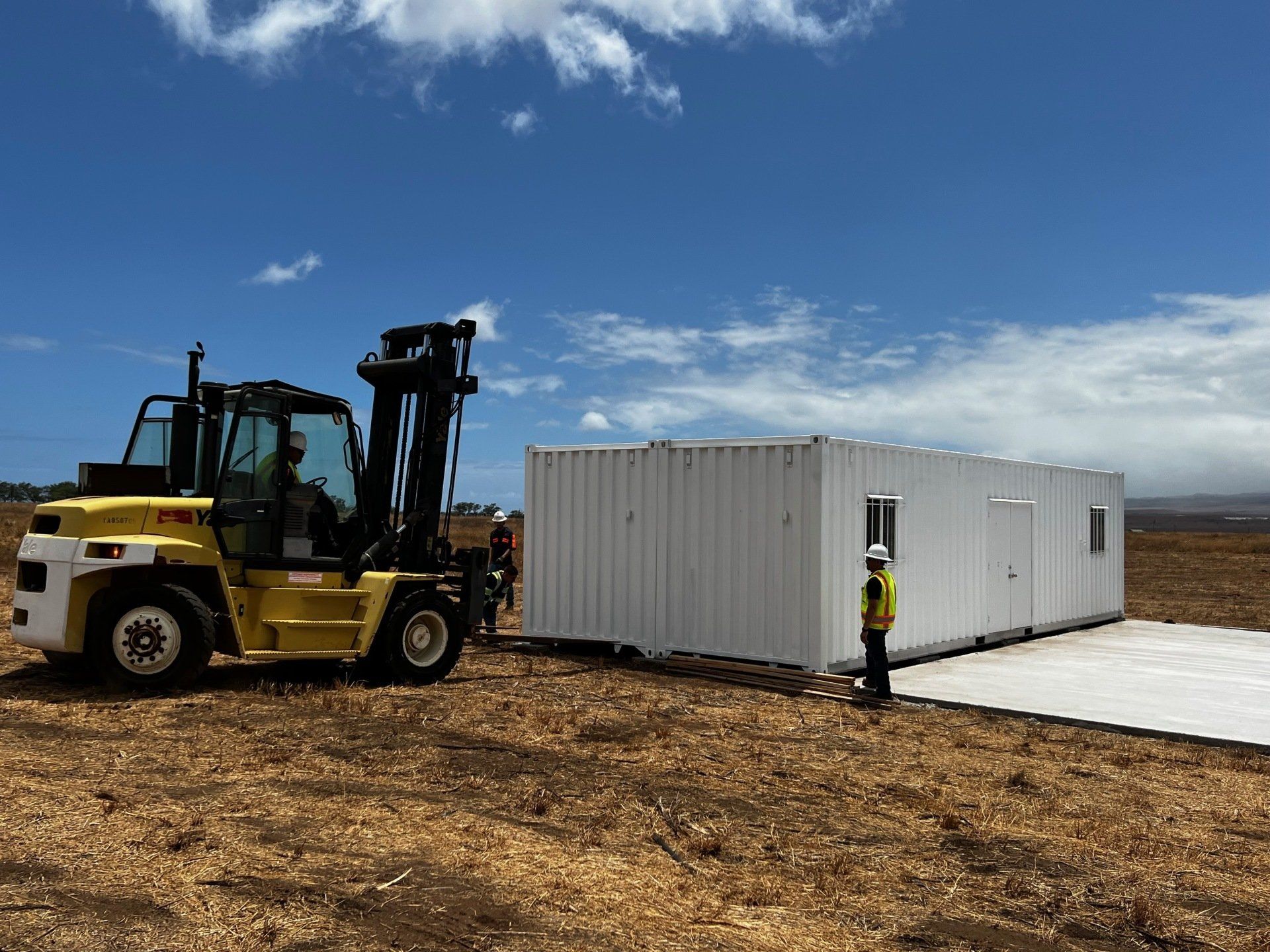 Multiple-Wide Office and Custom Space containers being put in place to create double wide space
