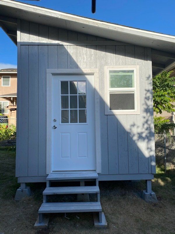 Studio Shed with door and window with slanted roof