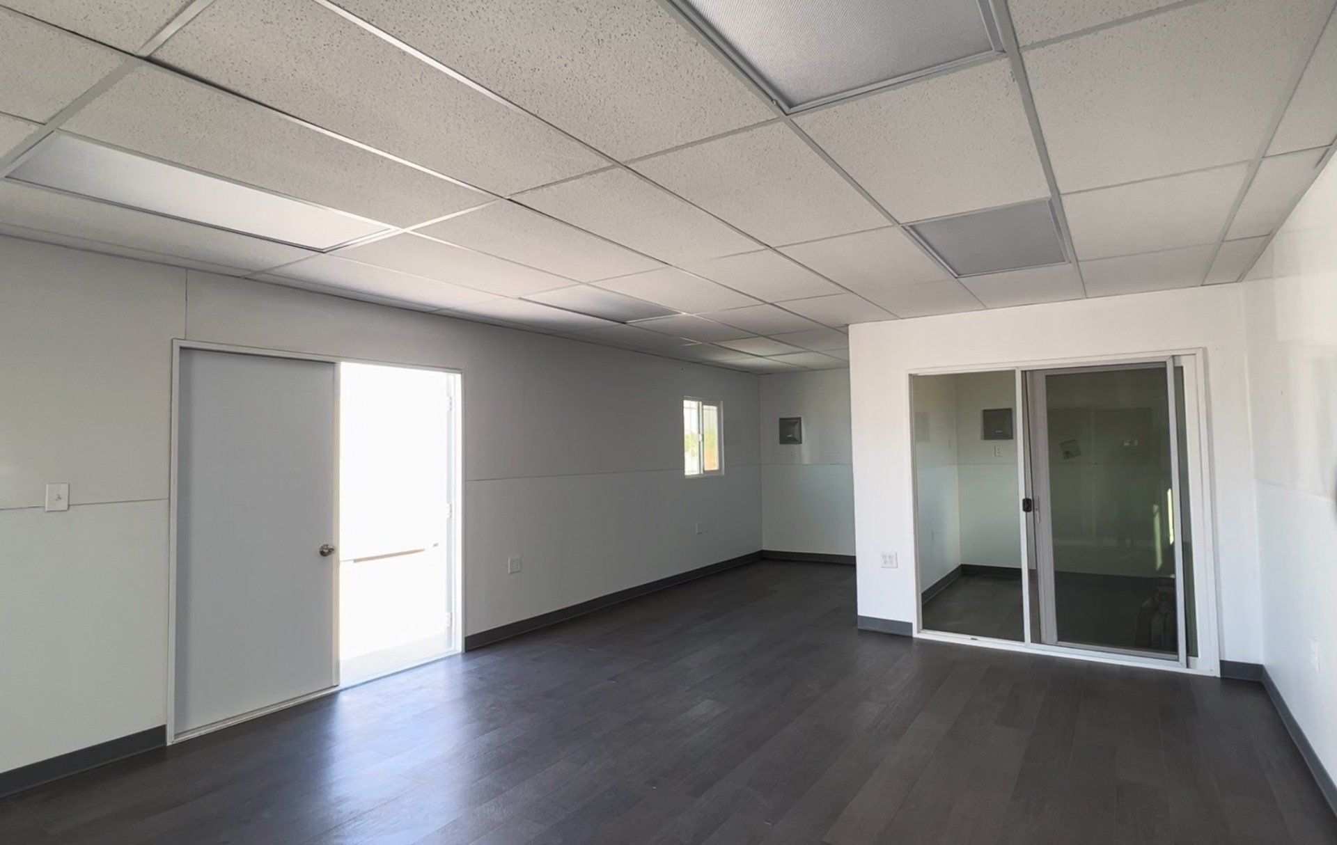 Multiple-Wide Office and Custom Space with sliding door room, window and door
