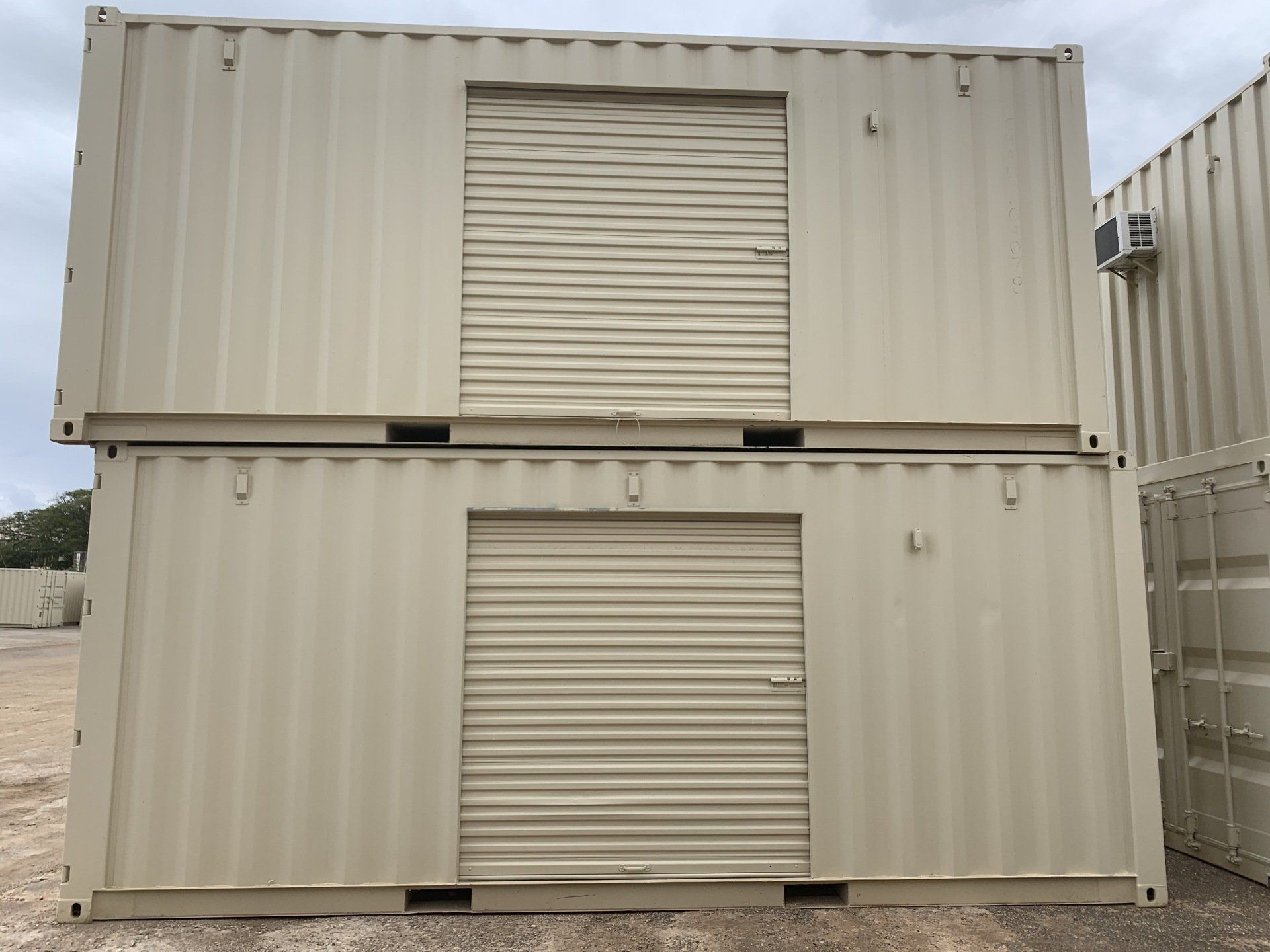 Shipping Container Storage Solution with rollup door stack on top of each other