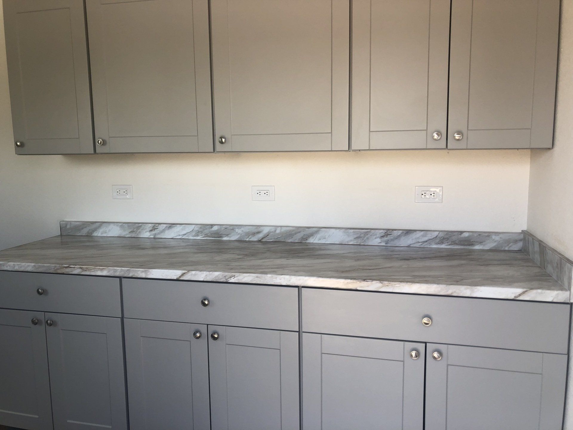 Custom Shipping Container Interior with custom kitchen cabinets