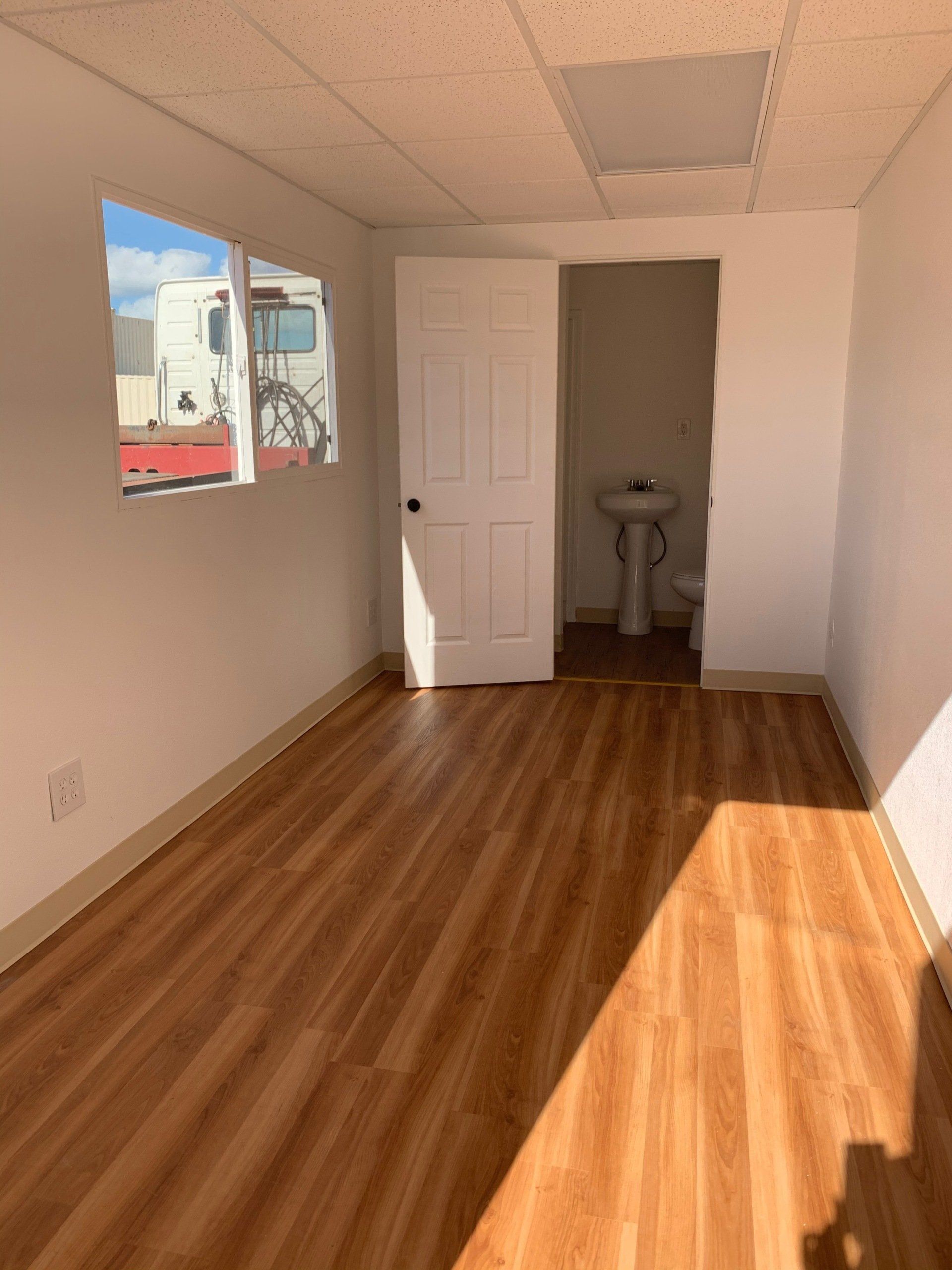 Deluxe Office Interiors with entrance, window, flooring and bathroom