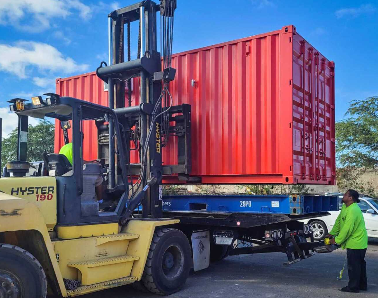Custom storage solution loaded on lift for transport