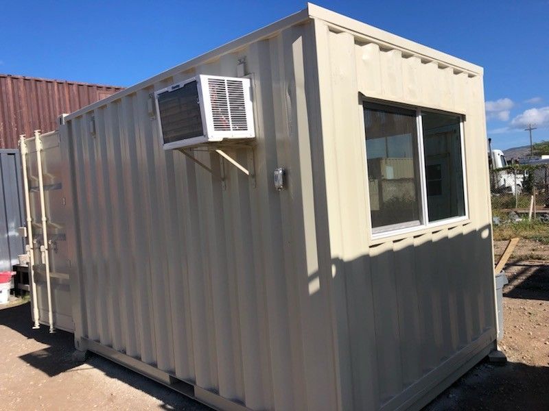 Exterior view of a 20' shipping container office with air conditioning unit.