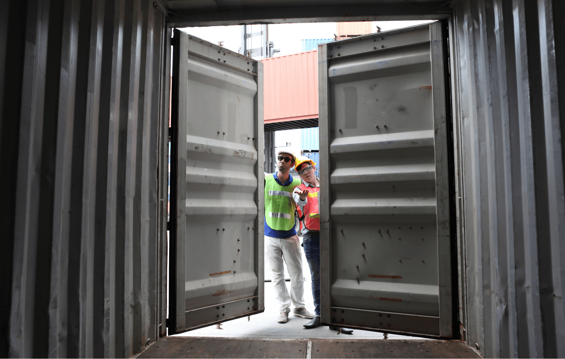 New (One Trip) 20' Standard Height Shipping Container interior looking at swinging doors