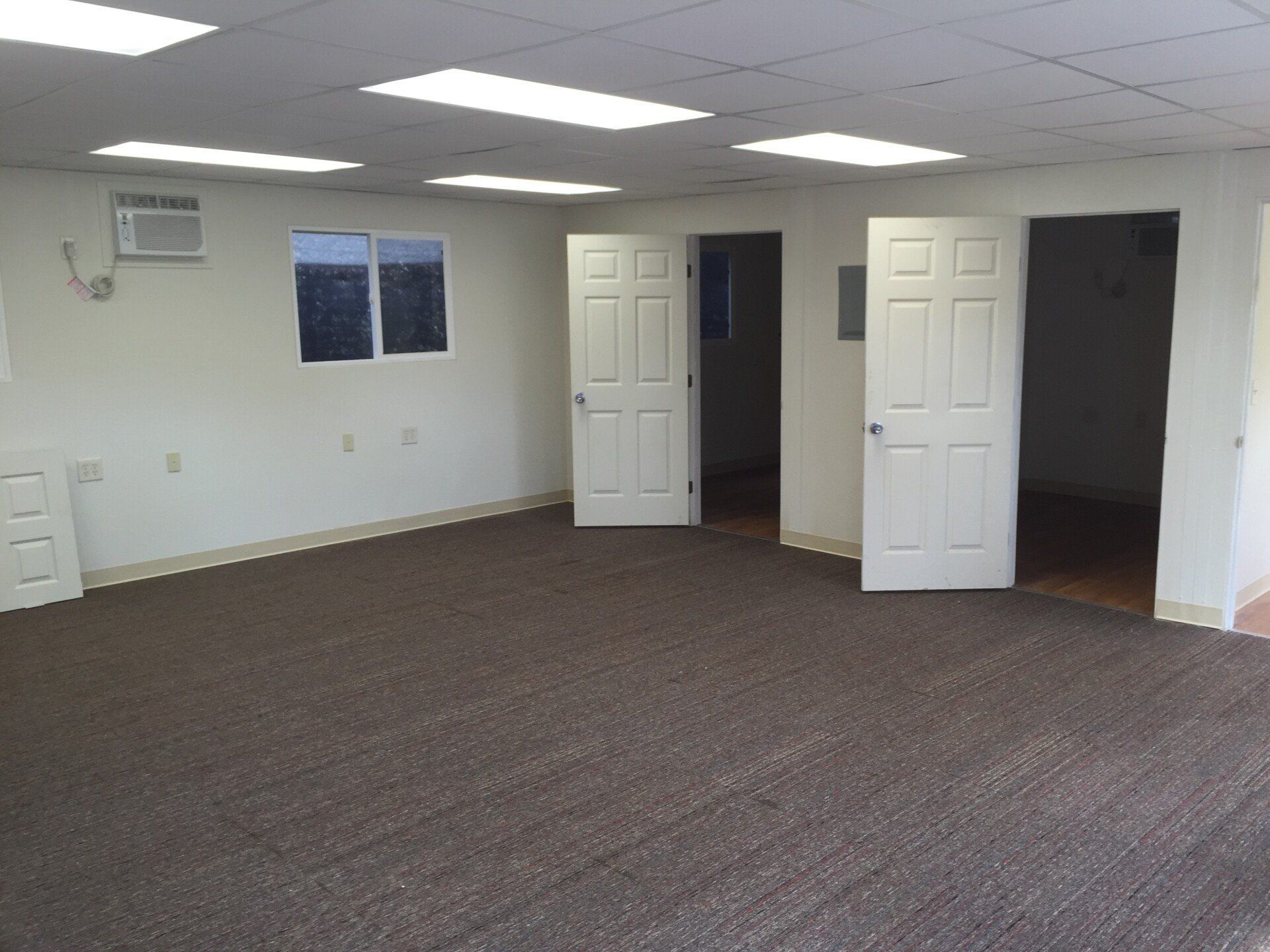 Custom and Multiple Wide interior office space with room partitions and doors
