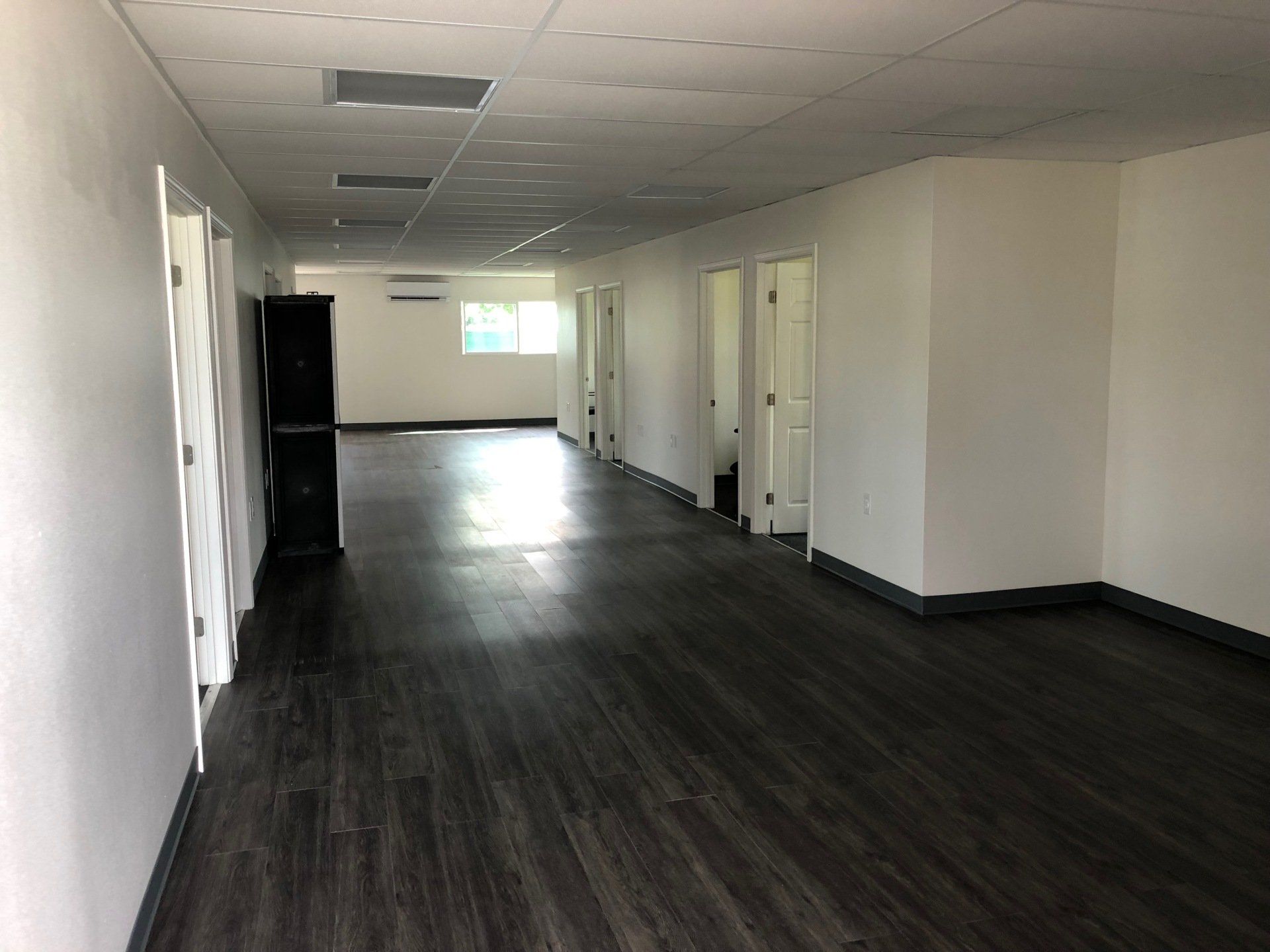 Multiple-Wide Office and Custom Space with partitioned rooms and flooring
