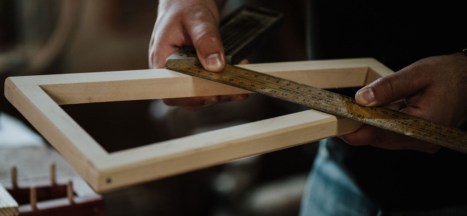 A Person is Measuring a Piece of Wood With a Ruler — GC Joinery in Sunshine Acres, QLD