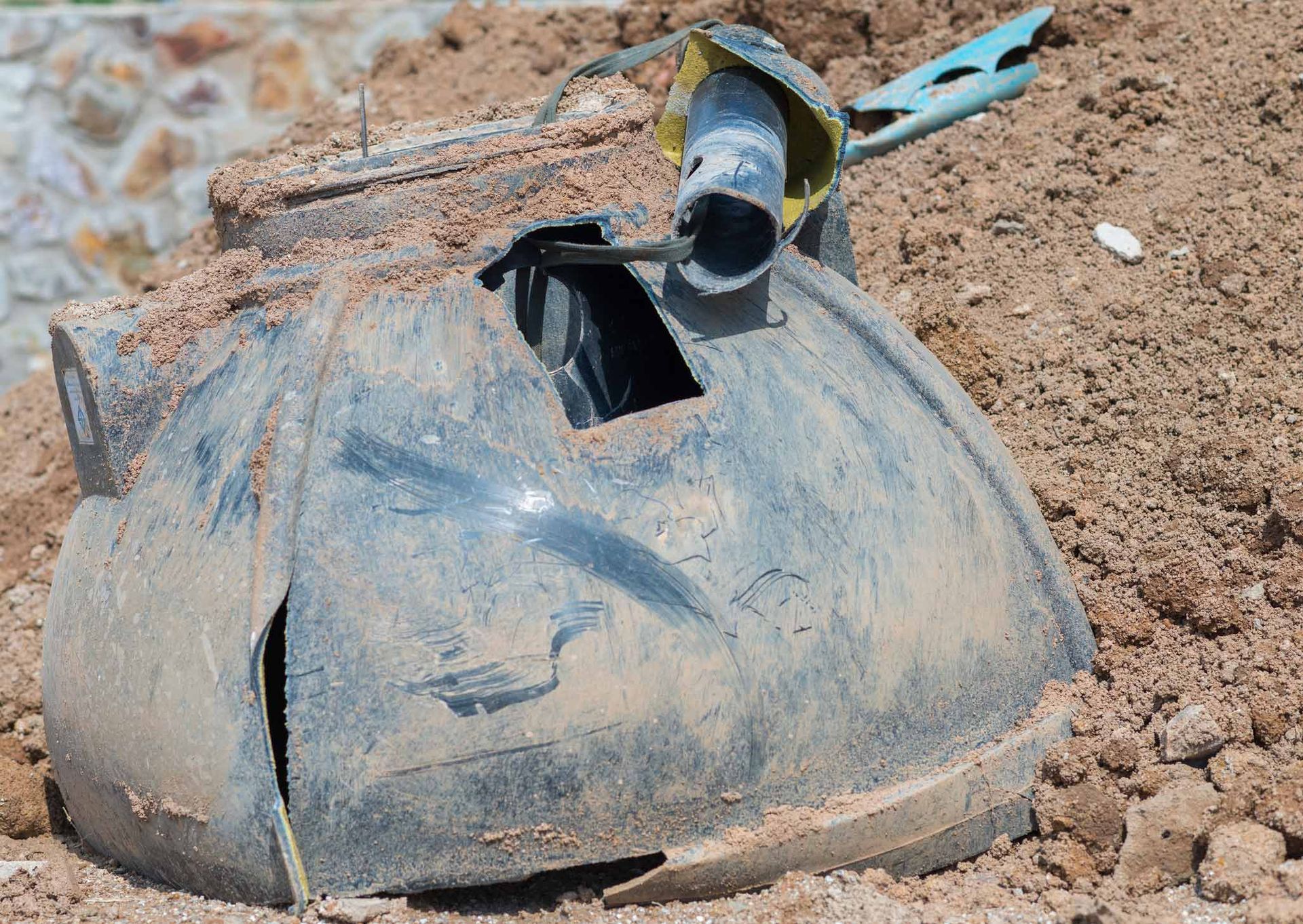 Black Septic Tank Buried In Broken Soil — Leicester, NC — Mike Septic Tank Services Black Septic Tank Buried In Broken Soil — Leicester, NC — Mike Septic Tank Services