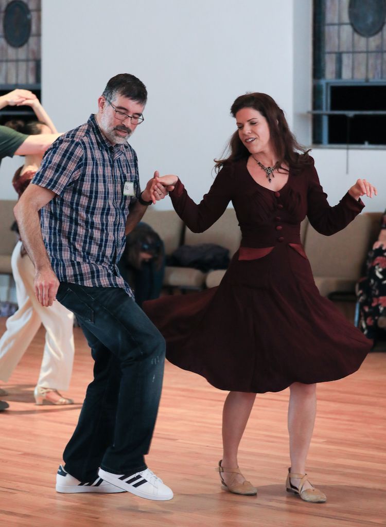 two dancers swing dancing