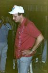Man in Red Shirt Standing