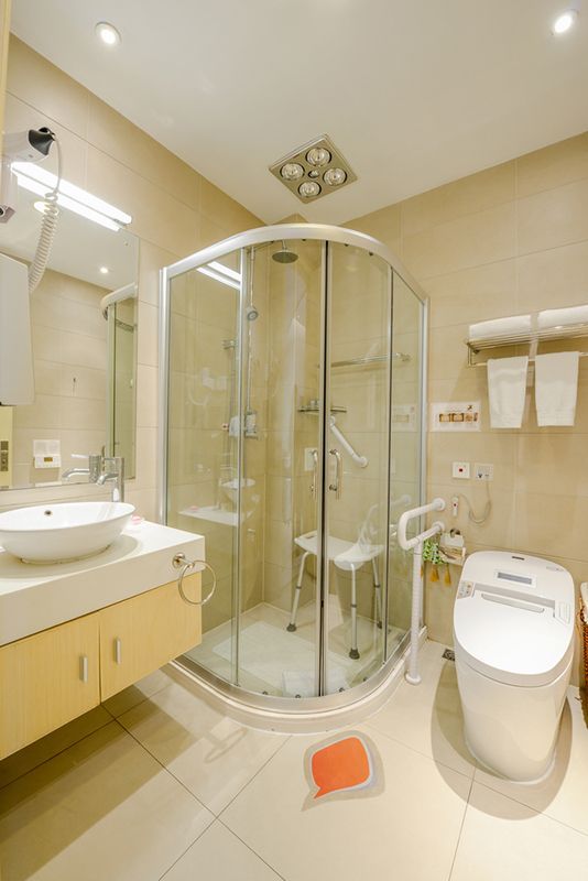A Bathroom with A Toilet, Sink, Shower and Mirror — Glen Lamberts Wall Cladding & Home Improvements in Wauchope, NSW
