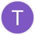 Purple circle with a white capital T centered inside.