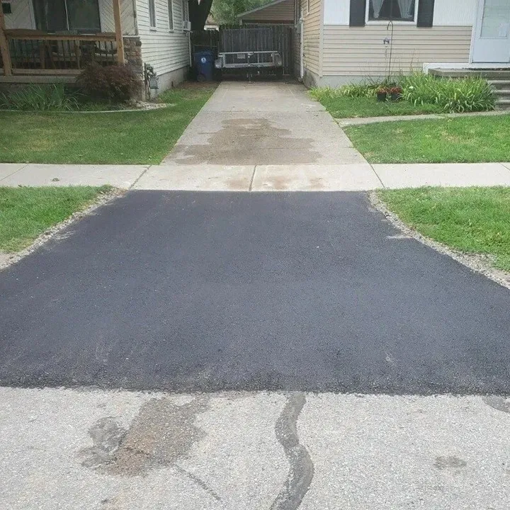 A driveway that has been paved with asphalt, DJs Paving, asphalt paving company, Canton, MI.